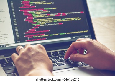 Programming Work Time. Programmer Typing New Lines of HTML Code. Laptop and Hand Closeup. Working Time. Web Design Business Concept.