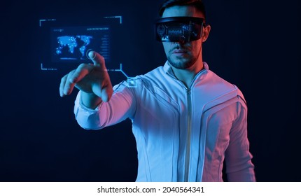 Progress bar loading. Man with futuristic tablet in hand. Guy using VR glasses. Augmented reality, future technology concept. Futuristic holographic loading interface.