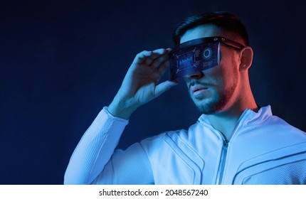 Progress bar loading. Man with futuristic tablet in hand. Guy using VR glasses. Augmented reality, future technology concept. Futuristic holographic loading interface.