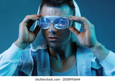 Progress bar loading. Man with futuristic tablet in hand. Guy using VR glasses. Augmented reality, future technology concept. Futuristic holographic loading interface.