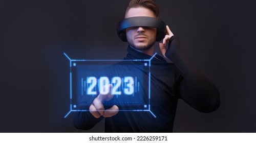 Progress bar loading. Man with futuristic tablet in hand. Guy using VR glasses. Augmented reality, 2023 concept. Futuristic holographic loading interface.