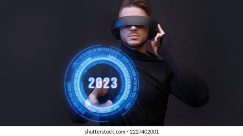 Progress bar loading. Man with futuristic tablet in hand. Guy using VR glasses. Augmented reality, 2023 concept. Futuristic holographic loading interface.