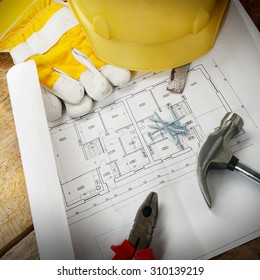 project drawings  and tools on table - Shutterstock ID 310139219