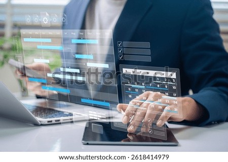 Project management and scheduling analytics. A professional using real-time progress tracking and task prioritization for workflow efficiency, timeline management, and strategic planning success.
