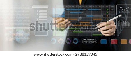 Project management and workflow analytics concept. Business professional using digital dashboard with timeline charts, task tracking and KPI performance data. project, management, workflow, analytics