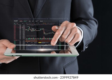 Project manager with digital tablet with graph chart
