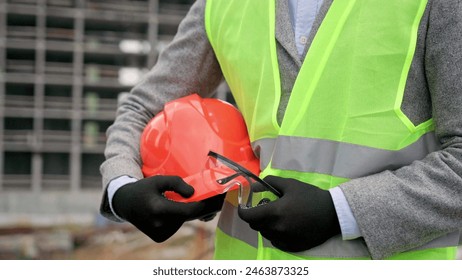 Project manager leaving building site after inspection - Powered by Shutterstock