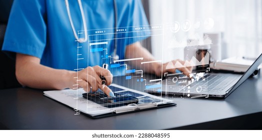 Project manager working   update tasks and Gantt chart scheduling diagram at hospital  success smart medical doctor working and smart medical doctor as concept 