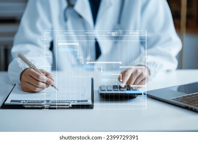 Project manager working and update tasks with Gantt chart scheduling diagram at hospital .success smart medical doctor working with smart medical doctor as concept. in office