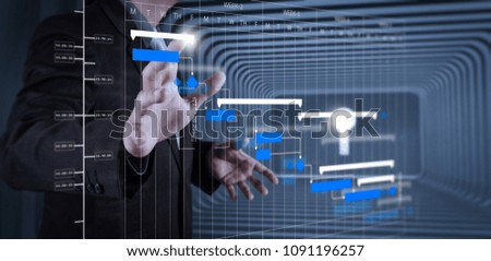 Project manager working and update tasks with milestones progress planning and Gantt chart scheduling diagram.business man with an open hand as showing something concept.