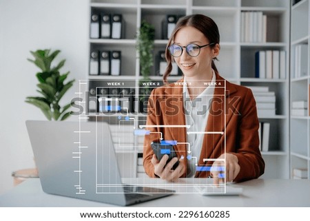 Project manager working and update tasks with milestones progress planning and Gantt chart scheduling diagram. business working with smart phone, tablet and laptop in office