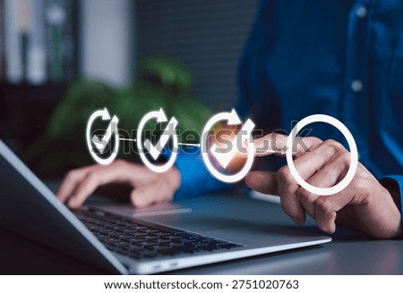 Project planning and workflow management concept Person using laptop with virtual checklist and progress icon, representing task tracking, business process automation, efficient step by step execution