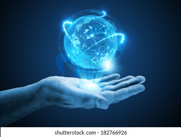 Projecting The Future. A hand holding a holographic projection. - Powered by Shutterstock