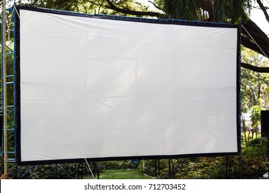 Projection Screen In The Garden For Outdoor Movies Theater. 