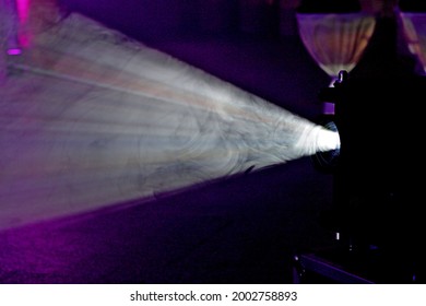 Projector light in the dark room - Shutterstock ID 2002758893