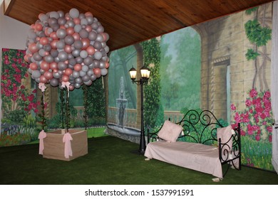 Prom Photo Shoot Area Set Up With A Hot Air Balloon Prop And A Bench 