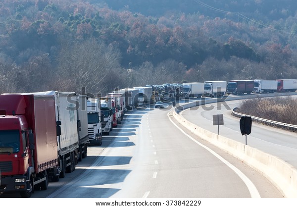 Promachonas, Greece - February 7 2016\
:International transport trucks are blocked  from the border\
crossing of Promachonas between Greece and Bulgaria, as farmers set\
up a blockade at customs\
offices.