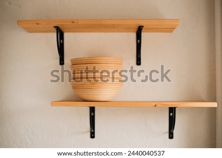 proofing baskets for bread on a shelf. High quality photo