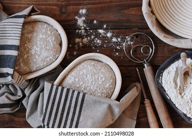 Proofing dough in a special basket. Raise the dough before baking. Yeast-free dough. The fermentation process of the dough. Sourdough bread - Powered by Shutterstock