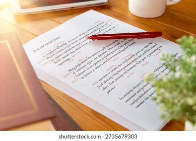 proofreading paper with errors and red correction words for proofreading service concept