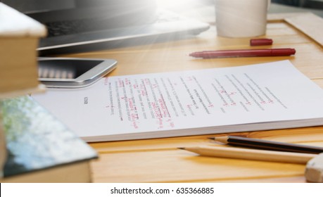 proofreading text on table in office