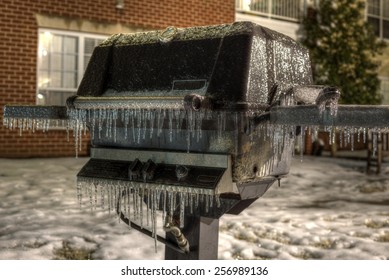 Propane Grill Frozen Over With Ice In Winter