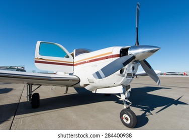 Propeller Aeroplane Standing On Asphalt Landing Runway