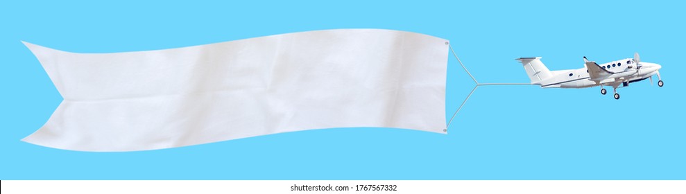 Propeller aircraft with a long white advertising banner made of fabric. Isolated on a blue background