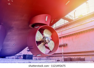 Propeller During To Repair Already Of Big Cargo Ship Stern Bow Thruster Freshly Fitted In A Boat Hull At Floating Dock In Shipyard Thailand