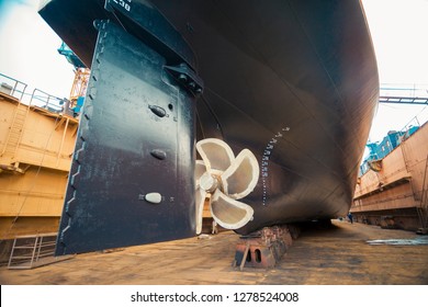 Propeller And Keel Of A Large Cargo Ship In Dry Dock Under Repair