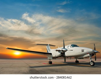 Propeller plane parking at the airport
