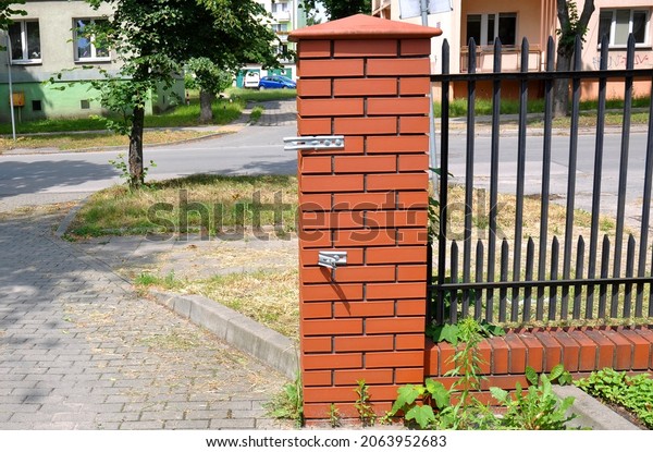 Property fence, broken off\
gate