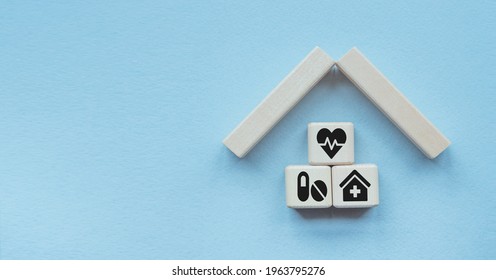 Property Insurance Concept. Small Toy House .Concepts For Health Care And Medical , Life, Transport, Property, Business Insurance. The Concept Of Insurance