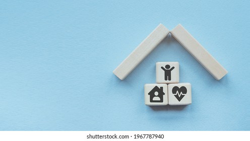 Property Insurance Concept. Small Toy House .Concepts For Health Care And Medical , Life, Transport, Property, Business Insurance. The Concept Of Insurance