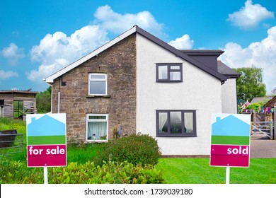 Property Sales UK. Estate Agents For Sale and Sold Signs on semi detached Houses. Visual to show benefits of property maintenance for house sales. Contrast of run down versus well maintained property