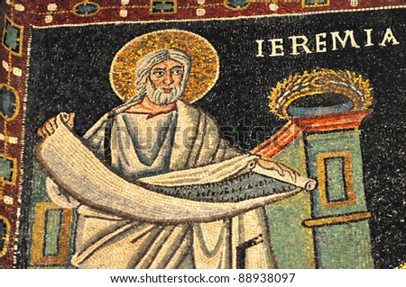 The prophet Jeremiah holding one of his scrolls. Scene from the UNESCO listed byzantine basilica of St Vitalis in Ravenna, Italy
