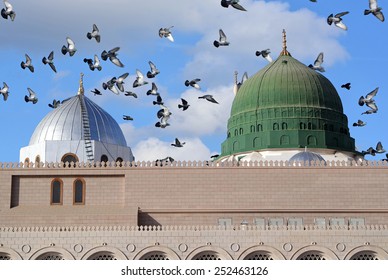 Prophet Muhammed Holy Mosque And Pigeons Flying In The Sky In Medina, KSA