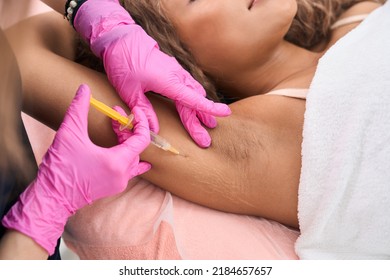 Prophylactic injection of hyaluronic acid in the clinic of aesthetic medicine - Shutterstock ID 2184657657