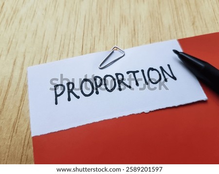 Proportion writting on table background.