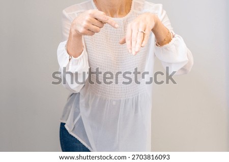 Proposal Accepted: Engaged Couple's Hands Interlocked, Showing Ring Detail