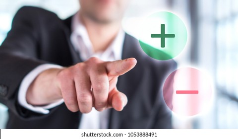 Pros And Cons Concept. Business Man Touching Plus Or Minus Symbol. Choosing Between Two Options.