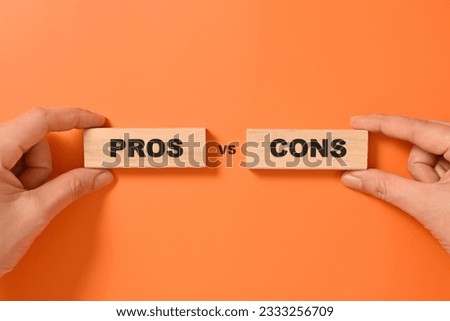 Pros and cons text on wooden blocks, Advantages and disadvantages for business management, Personal perspective, Concept of positive or negative decision making or choice of approval or rejection