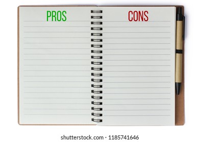 Pros And Cons Text Words Written On Notepad With Pen On The Side And Empty Pages For Text Isolated On A Seamless White Background. Concept Risk Benefit Assessment And Business Plan Analysis.