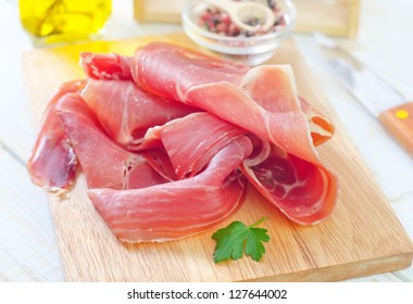 Proscuitto On A Wooden Board