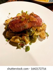 Proscuitto Wrapped Cod Over Gnocchi