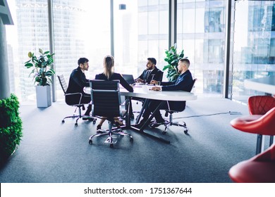 Prosperous team of partners have brainstorming meeting for consultancy about business plan, successful male an female proud ceo discussing information talking indoors during cooperation marketing - Shutterstock ID 1751367644