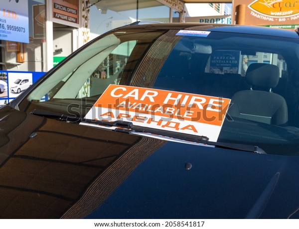 Protaras, Cyprus -\
Oct 6. 2019. Car hire available - sign with the inscription on the\
glass of the car
