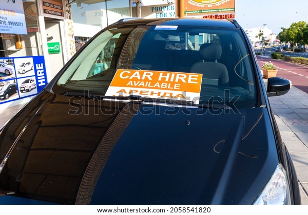 Protaras, Cyprus -\
Oct 6. 2019. Car hire available - sign with the inscription on the\
glass of the car