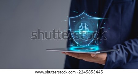 Protect your company's digital data with fingerprint scanning for identity verification. Cloud computing, Smart industry, Internet of things, New technology big data and business process strategy.