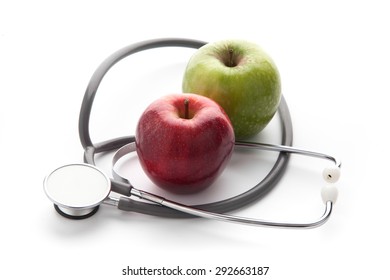  Protect your health with healthy nutrition: Stethoscope and apple 

